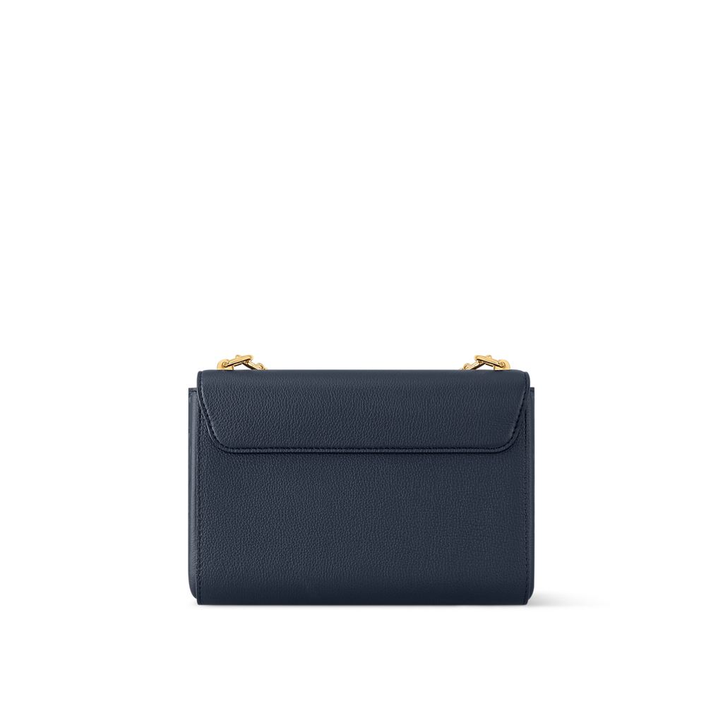 Sac à main Louis Vuitton Twist en cuir bleu marine avec chaîne dorée