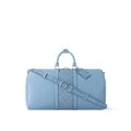 Sac Keepall Bandoulière 50 Louis Vuitton en cuir bleu clair avec bande centrale Monogram
