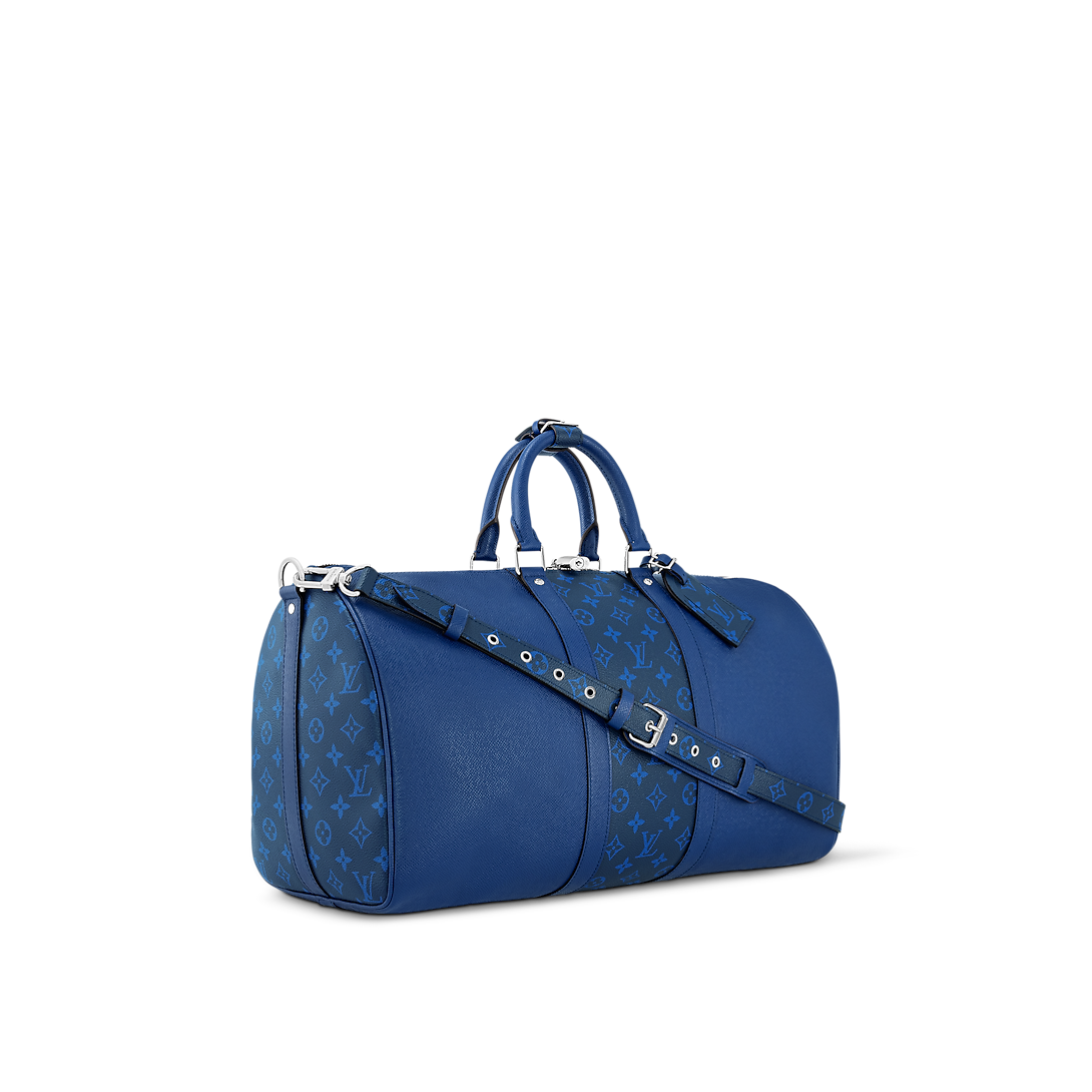 Sac Keepall Bandoulière 50  Louis Vuitton en cuir bleu avec bande centrale Monogram