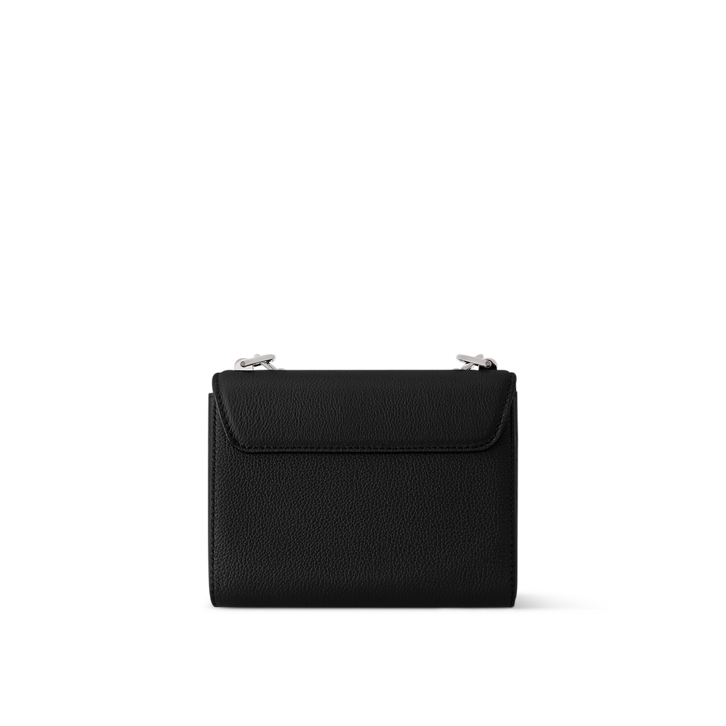 Sac à main Louis Vuitton en cuir noir avec logo LV et chaînes décoratives argentées