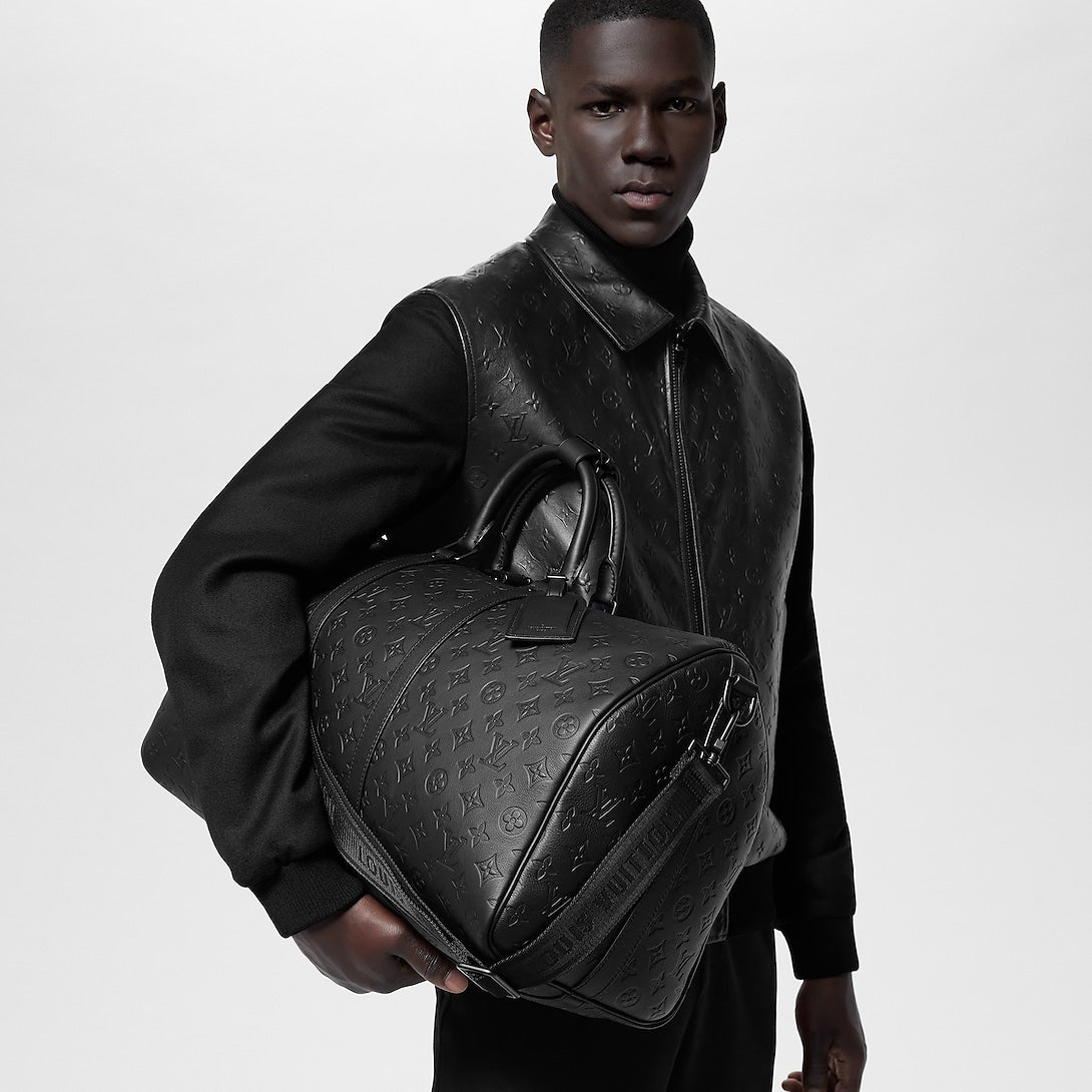 Sac Keepall Bandoulière 50 Louis Vuitton en cuir Monogram Empreinte noir