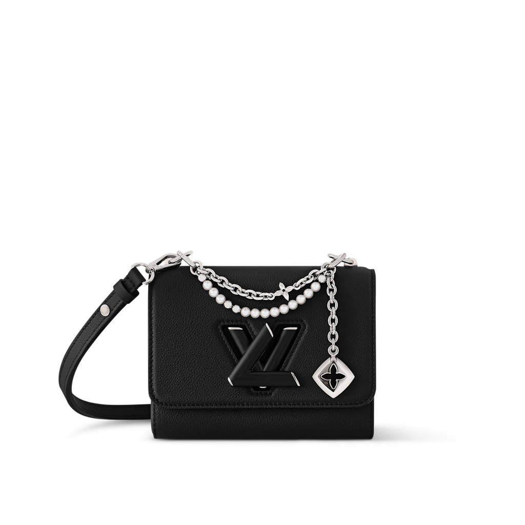 Sac à main Louis Vuitton en cuir noir avec logo LV et chaînes décoratives argentées