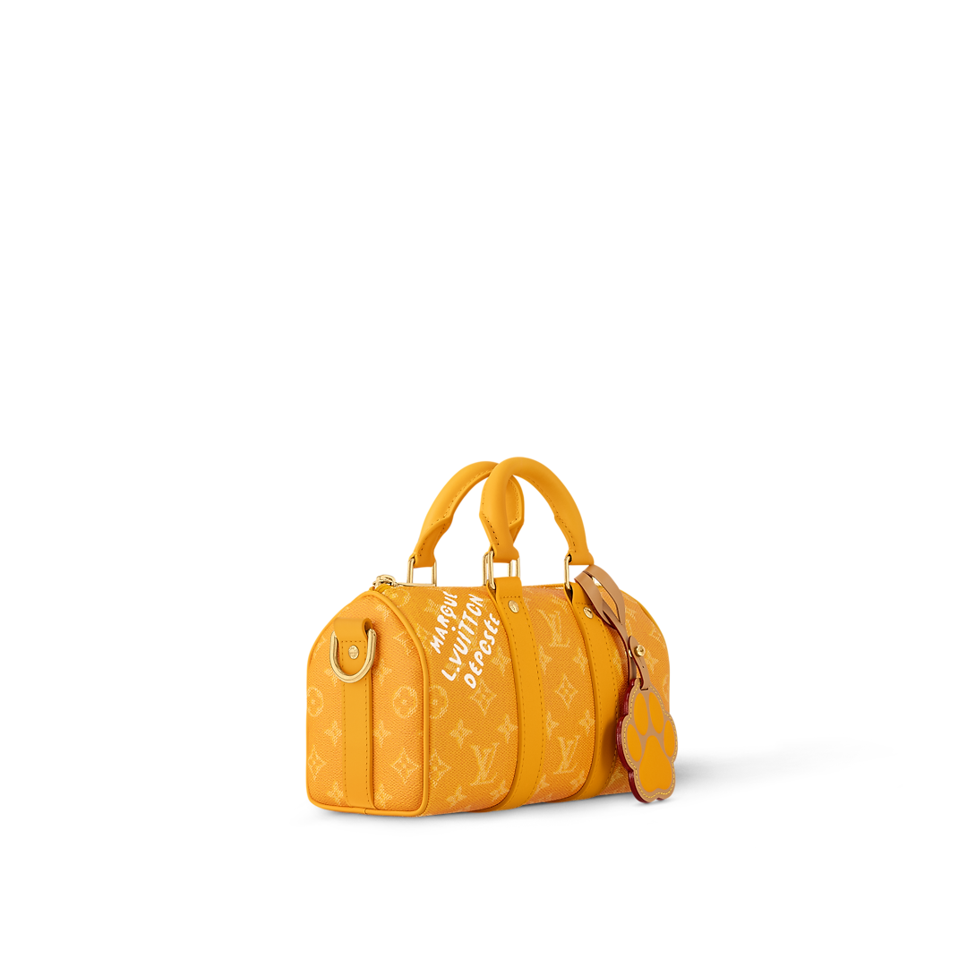 Sac Keepall Bandoulière 25 Louis Vuitton en toile Monogram jaune avec motif chien (collection LV x Animals / Paw)