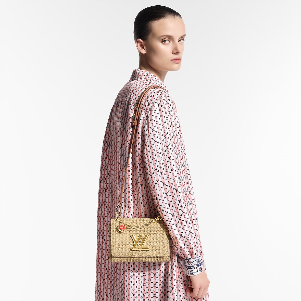 Sac à main Louis Vuitton en raphia tressé beige avec logo LV doré et bandoulière en cuir